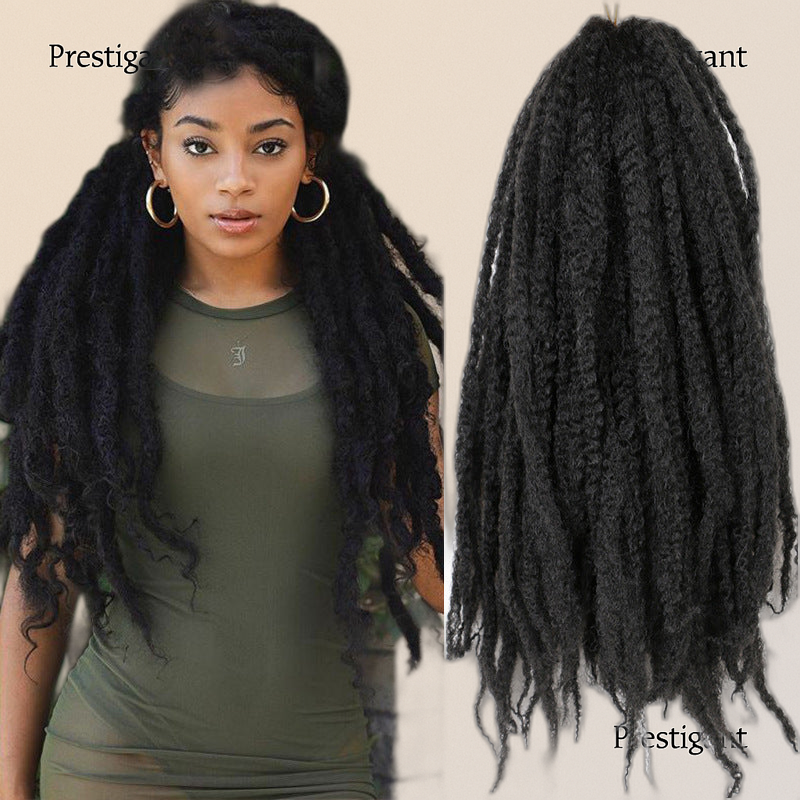 An image showing a synthetic  Big Puff Braid Wig with chunky braids and a playful puff design, worn by a model. The wig appears voluminous and the person wearing it has a playful expression.